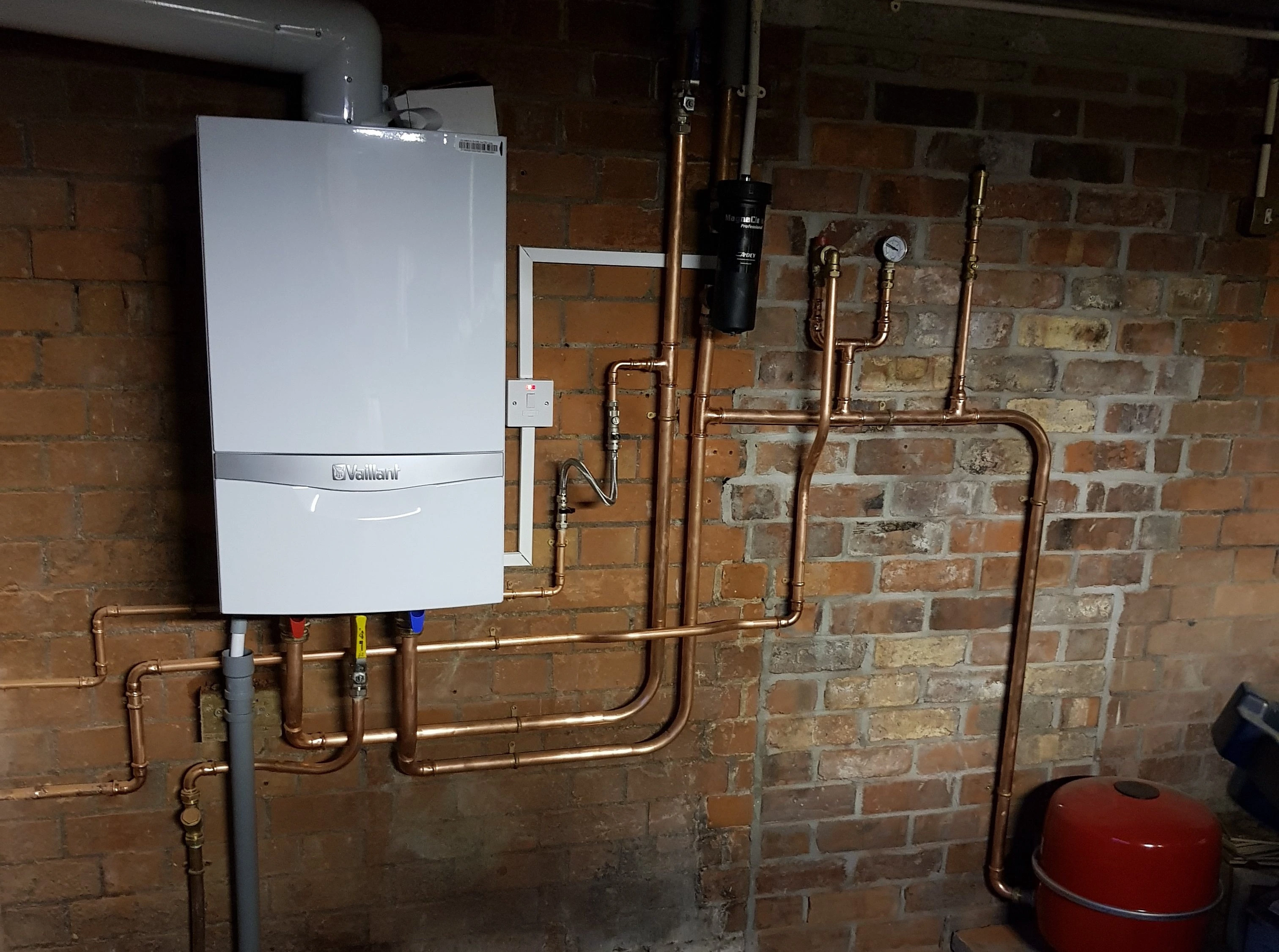 Gas boiler installation Belfast — Kelly Heating NI engineer at work