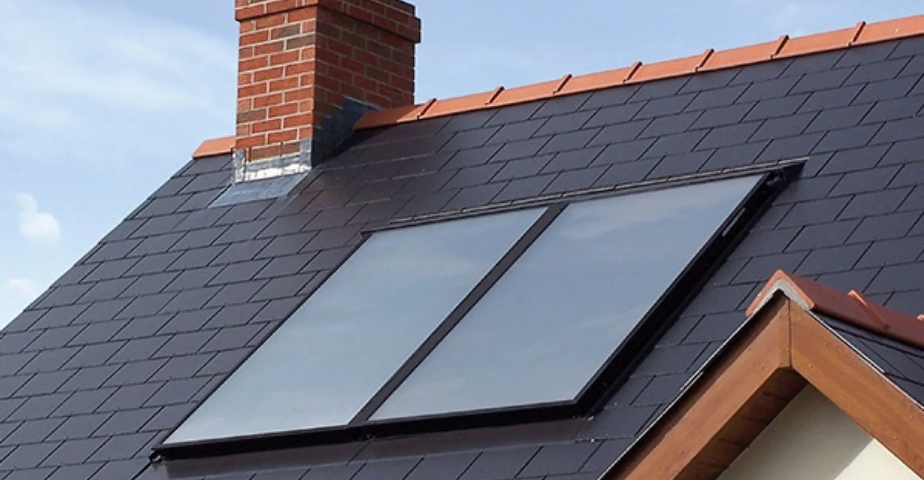 Flat plate solar thermal panels installed on a residential roof — solar water heating for Belfast and Lisburn homes