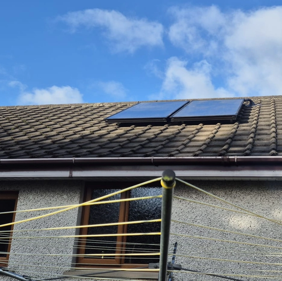 Solar thermal flat plate panels installed on a Lisburn home roof — Kelly Heating NI