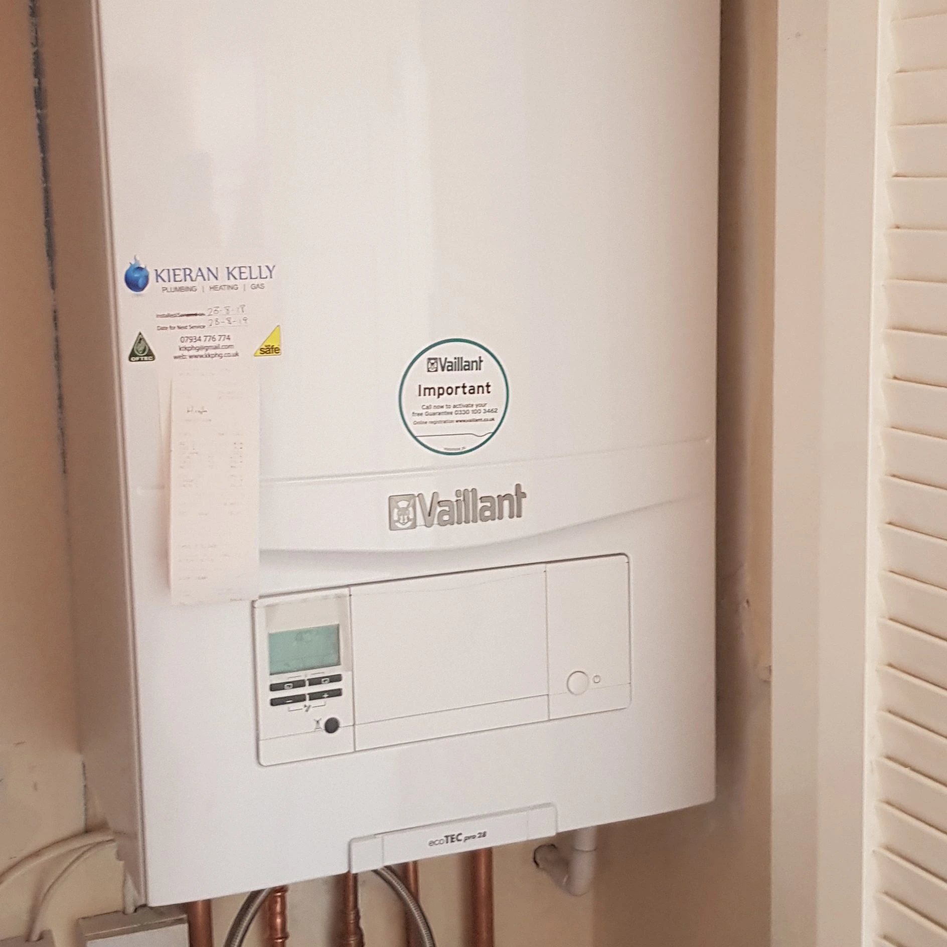 Vaillant ecoTEC boiler installed and labelled with Kieran Kelly Gas Safe service record — Belfast